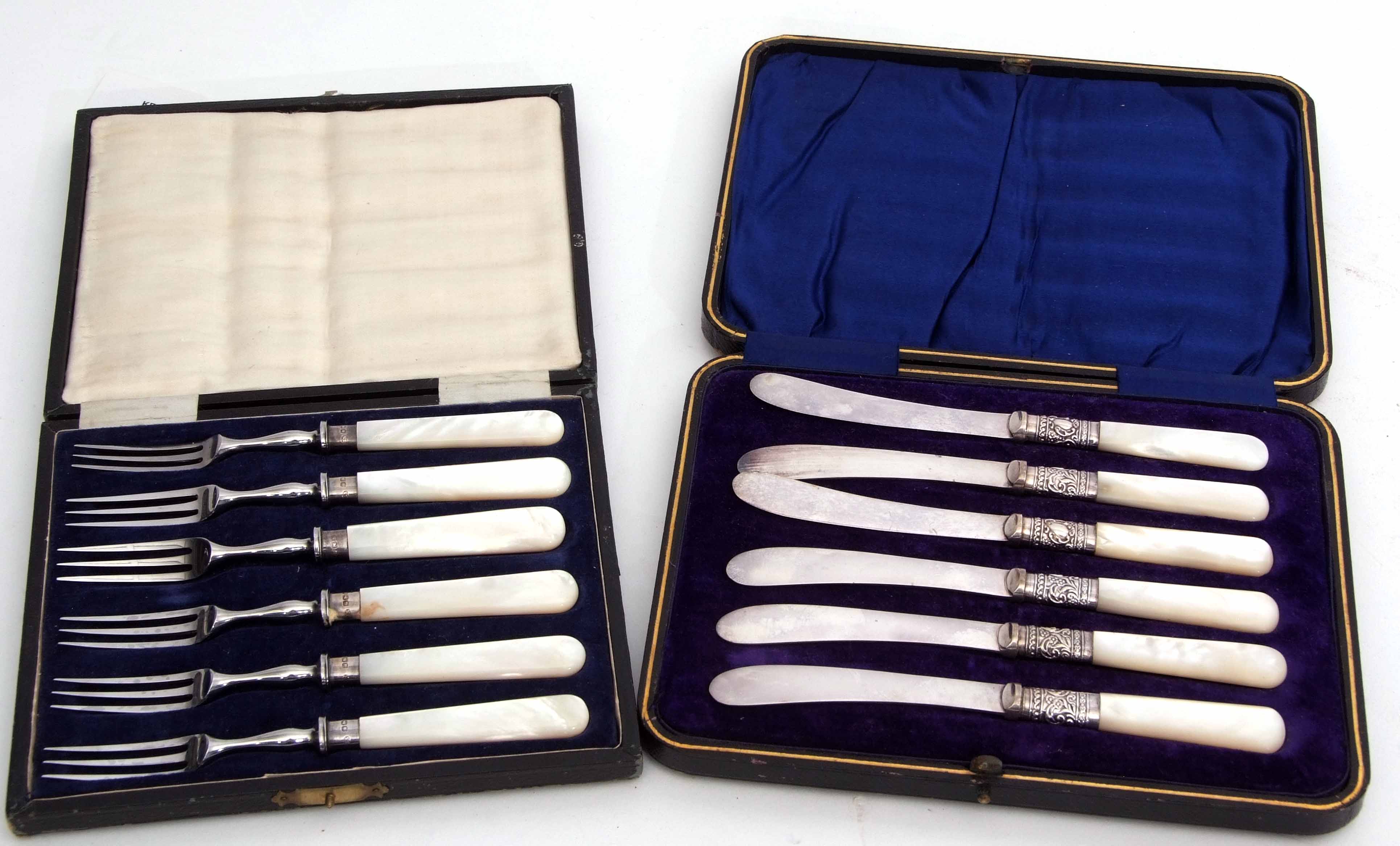 Mixed Lot: comprising a cased set of six mother of pearl handled stainless steel dessert forks