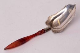 Late 19th century Continental white metal and banded agate caddy spoon of polished and waisted