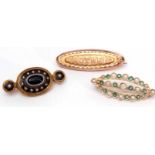 Mixed Lot: 9ct gold oval shaped open work brooch alternate set with small emeralds and graduated