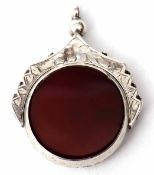 Late Victorian silver mounted swivel fob, featuring circular shaped bloodstone and carnelian panels,