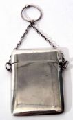 George V card case of plain polished rectangular form with hinged cover and chain suspension with