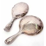 Mixed Lot: comprising two various silver backed dressing table hand mirrors, one with presentation