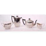 Early 20th century electro plated four piece tea set comprising hot water pot, tea pot, sugar