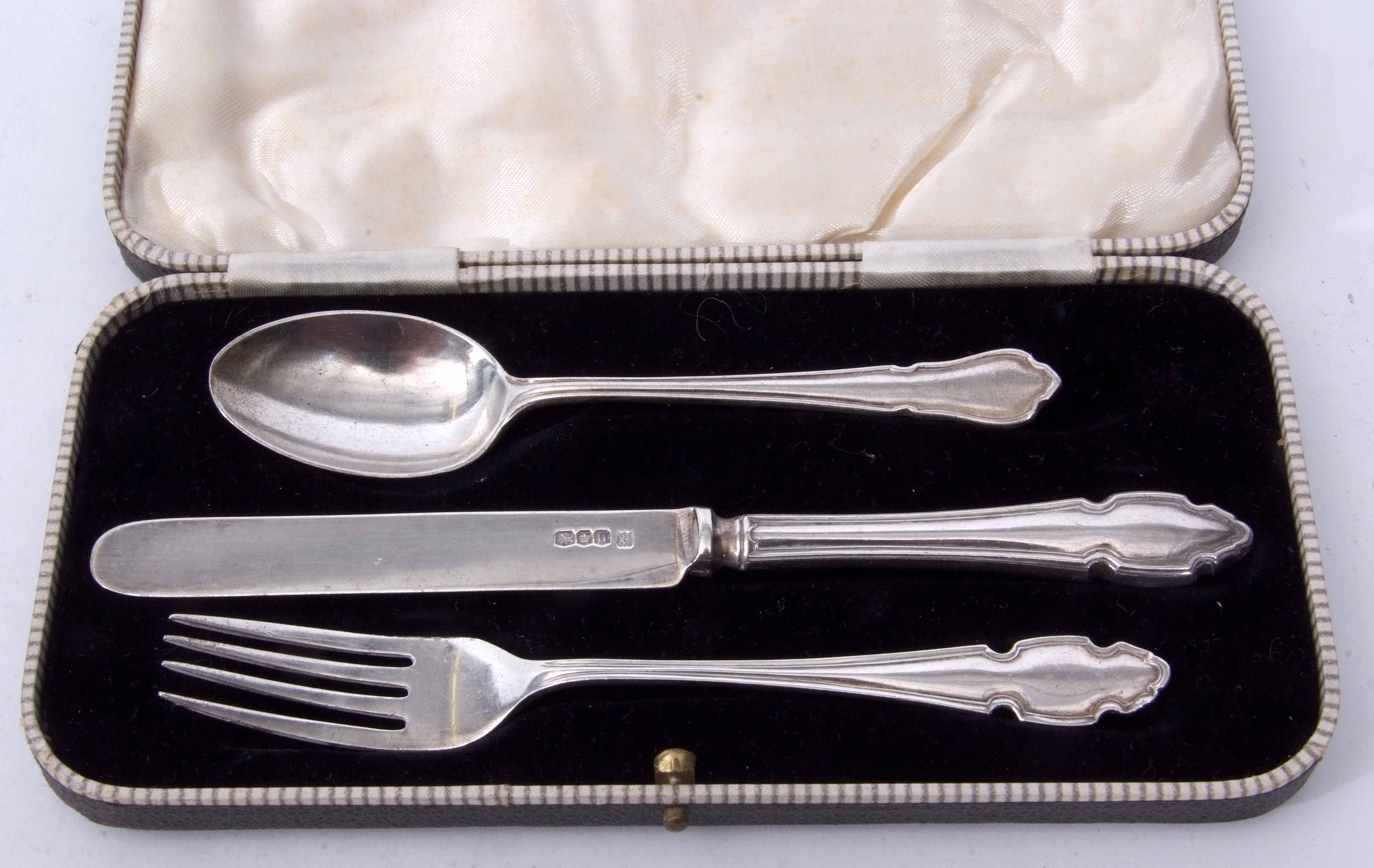 Elizabeth II cased three piece christening set comprising knife, fork and spoon, combined weight