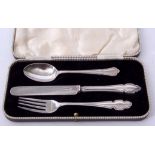 Elizabeth II cased three piece christening set comprising knife, fork and spoon, combined weight