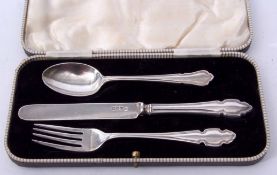 Elizabeth II cased three piece christening set comprising knife, fork and spoon, combined weight