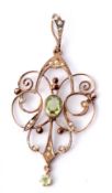 Edwardian 9ct seed pearl and peridot pendant featuring a central peridot and dropper, highlighted