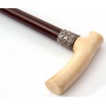 Late Victorian silver mounted ivory and rosewood walking stick, the plain and polished handle to a