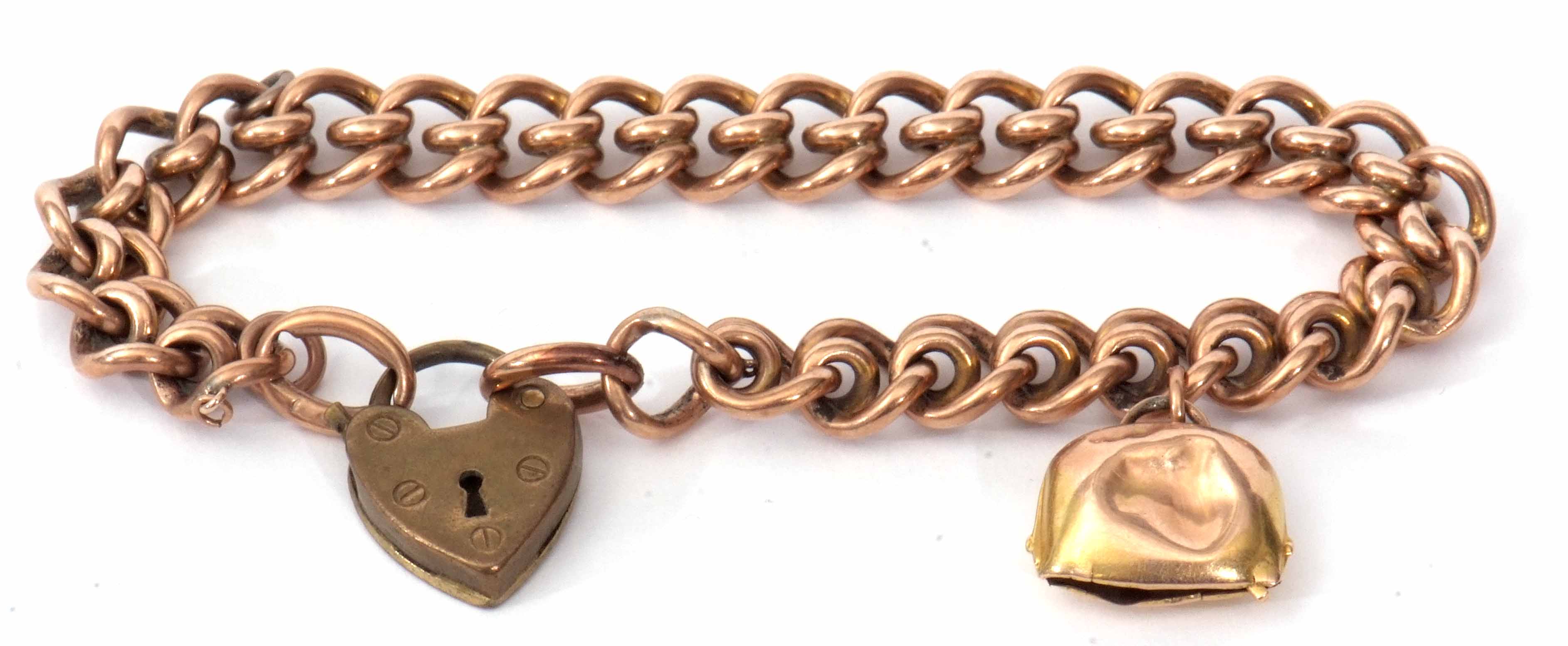 Mixed Lot: 9ct stamped curb link bracelet suspending yellow metal charm and gilt metal padlock, 18.