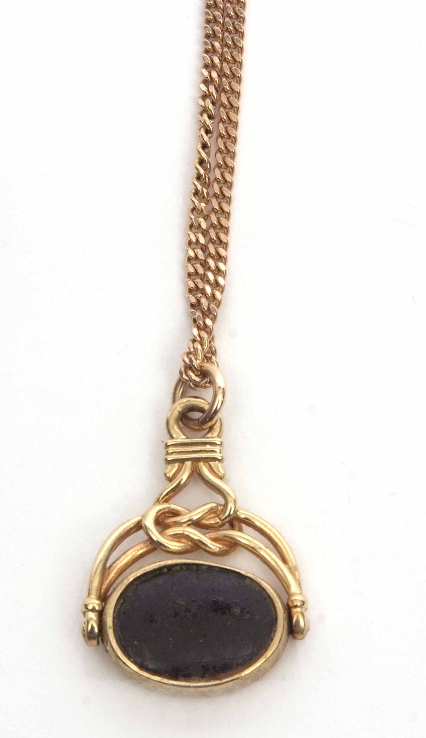 9ct gold framed swivel fob, oval shaped with a bloodstone and onyx panel, suspended from a filed - Image 2 of 3