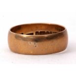 A 9ct gold wedding ring, hallmarked Birmingham 1975, 3.2gms, size M