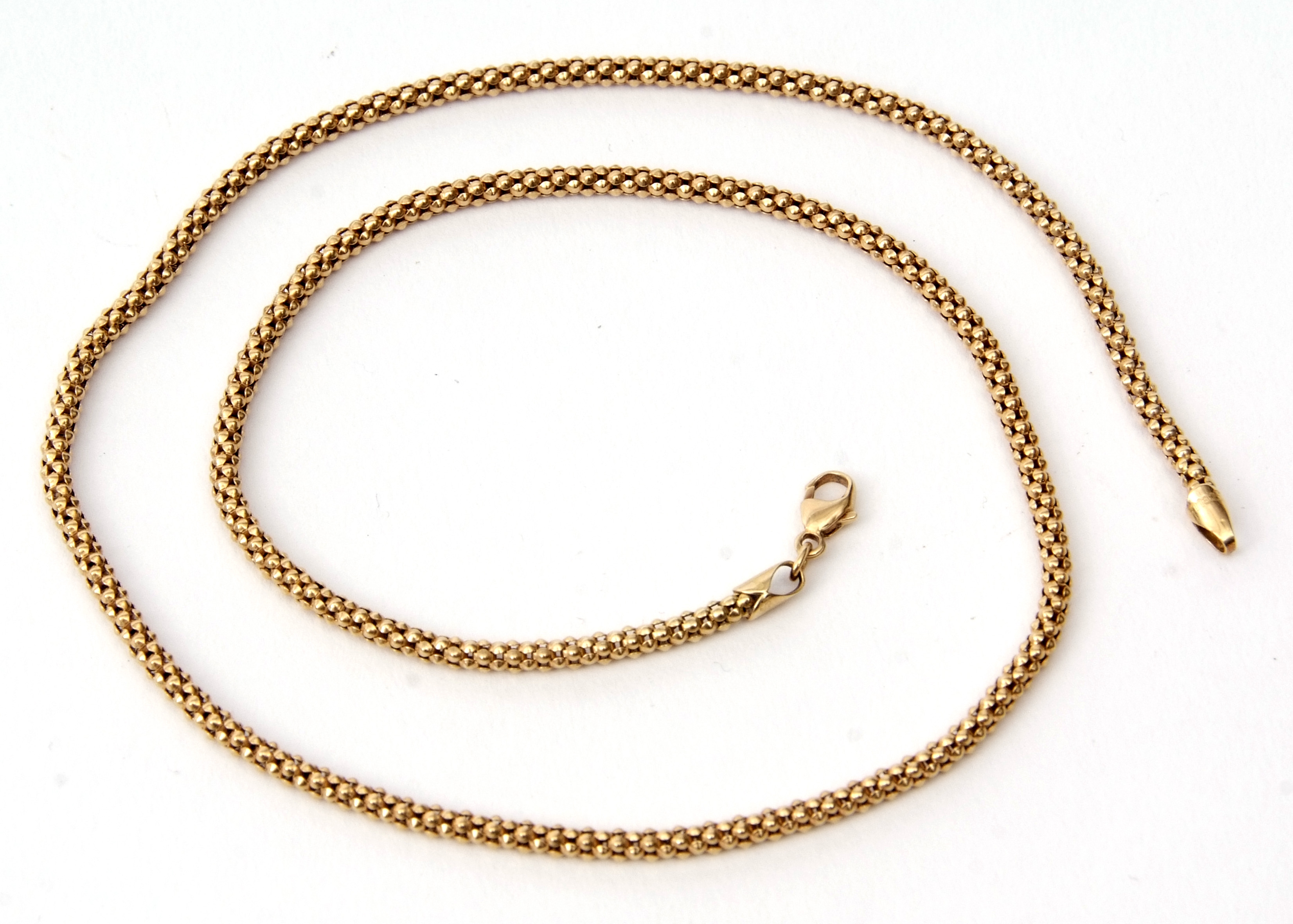 A 750 stamped fancy link necklace, 9.8gms, the clasp engraved "Stella", 46cm long