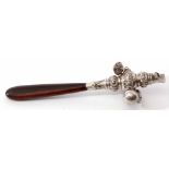 Late Victorian combination rattle of baluster form fitted with a whistle and ring suspension and