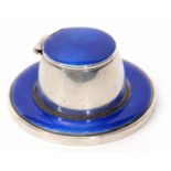George V silver and guilloche enamelled desk inkwell of circular form with engine turned base and