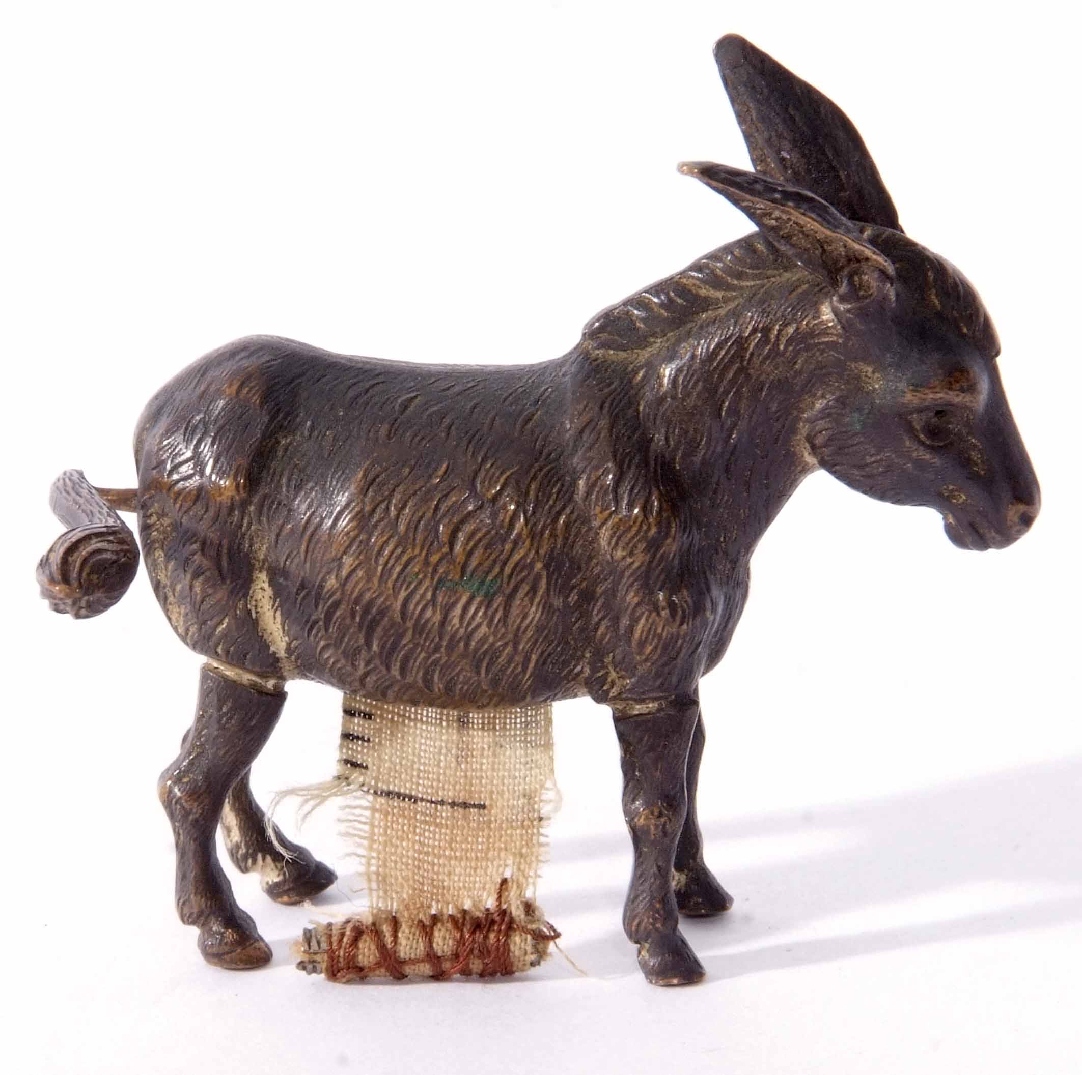 Late 19th century novelty tape measure, modelled in the form of a donkey with turning tail and - Image 2 of 2