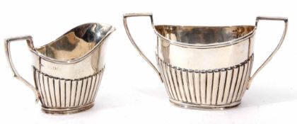 Mixed Lot: comprising non-matching bachelor's two handled sugar basin and milk jug, each of polished