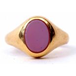 An 18ct gold and sardonyx signet ring, the oval plaque set in a rub-over setting, hallmarked