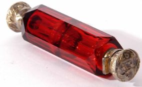 Late 19th century gilt metal mounted and red faceted glass double ended scent bottle, fitted with