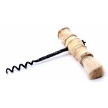 Late 19th century bone handled corkscrew the baluster turned handle fitted with a bristle brush