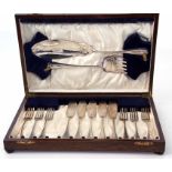 Oak cased set of six each fish forks and five knives together with servers in a silk and velvet