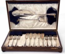 Oak cased set of six each fish forks and five knives together with servers in a silk and velvet