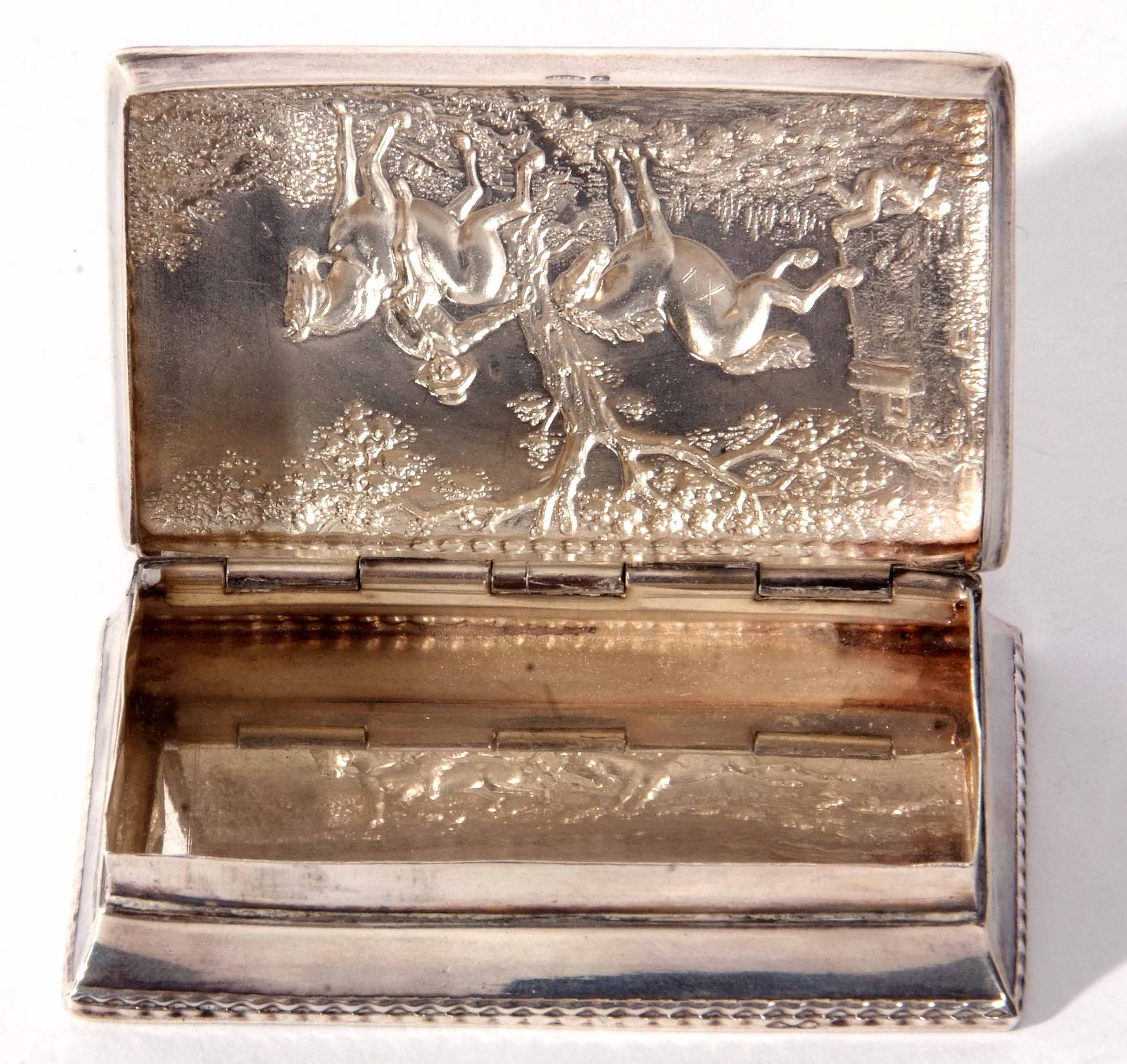 Edward VII Continental snuff box of rectangular form, the hinged cover embossed with an equestrian - Image 2 of 2