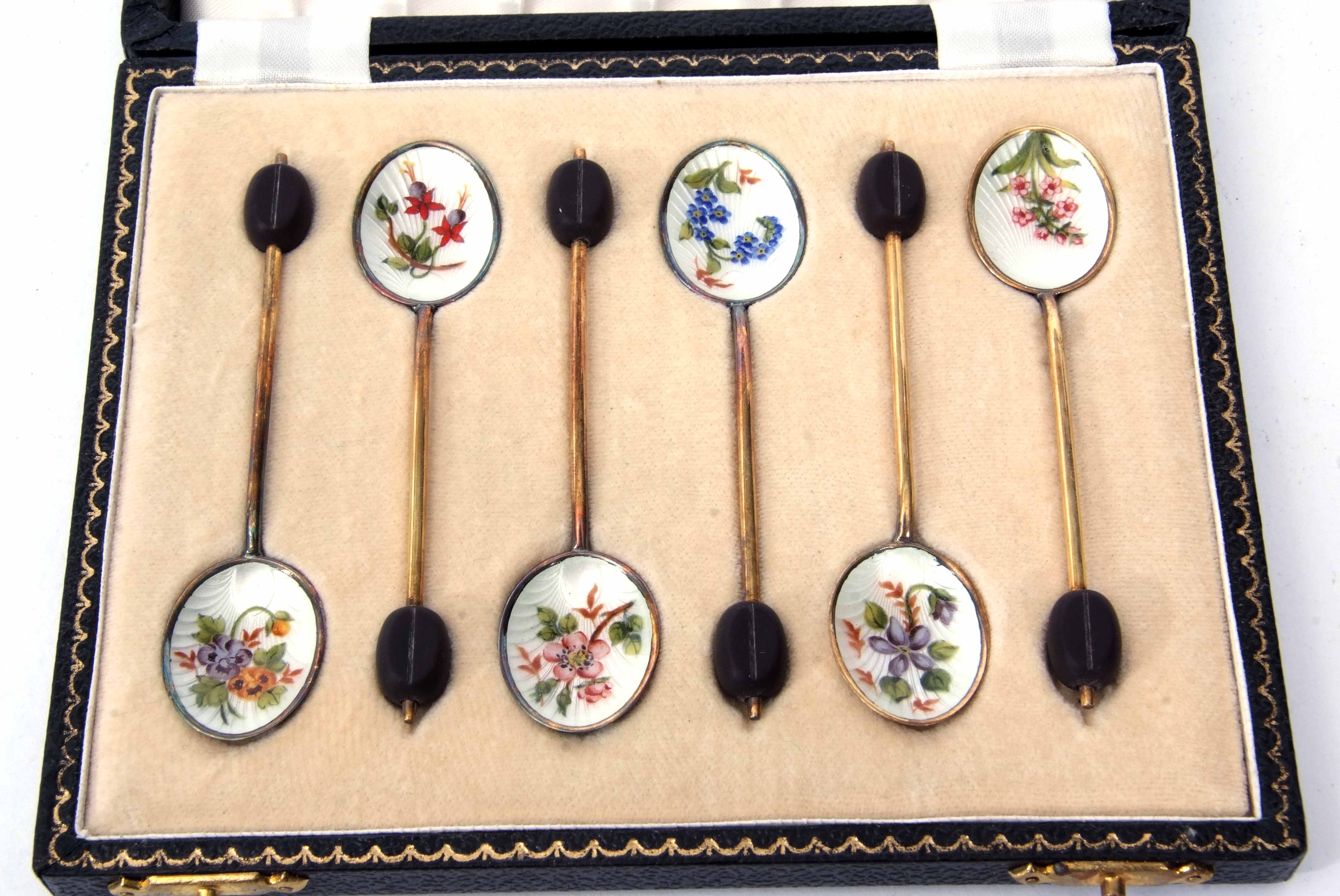 Cased set of six Elizabeth II silver gilt and enamelled coffee spoons, each with coffee bean finials - Image 2 of 3