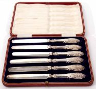 Cased set of six silver handled tea knives in a fabric lined and red fitted morocco covered case