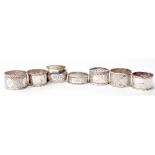 Mixed Lot: comprising seven various cylindrical napkin rings (conditions vary throughout),