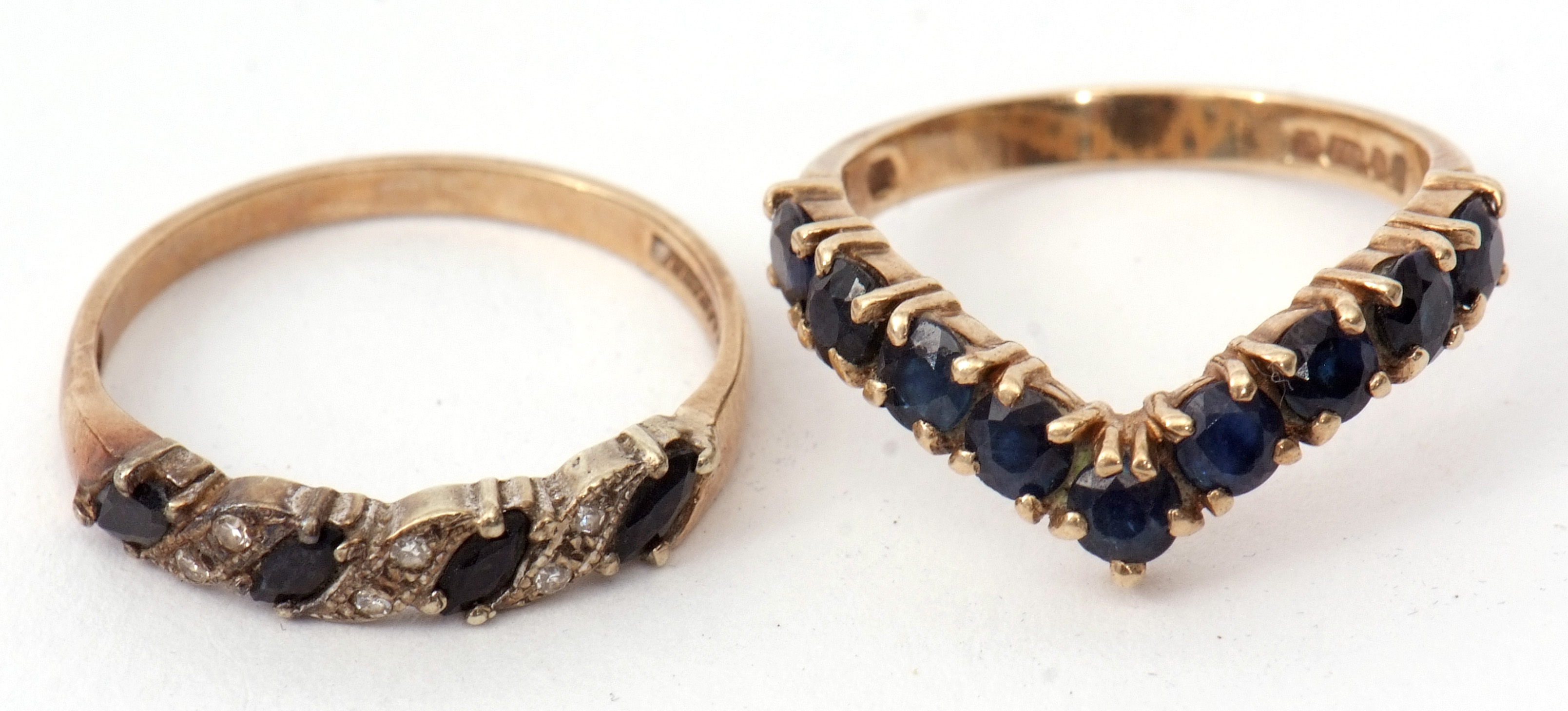 Mixed Lot: 9ct gold, sapphire and diamond ring featuring four faceted lozenge shaped dark sapphires, - Image 2 of 2