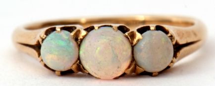 Three stone opal ring, featuring three graduated cabochon cut opals, individually claw set and