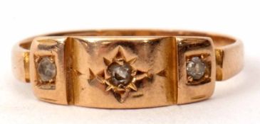 Late Victorian 15ct gold and three stone diamond ring featuring three old cut diamonds, each in