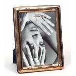 20th century white metal mounted easel backed photograph frame of plain and polished rectangular