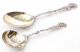 Edward VII cast serving spoon with figural handle and polished bowl with gilt lining together with a
