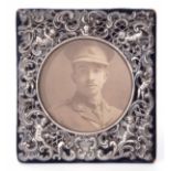 Edward VII silver mounted easel backed photograph frame of rectangular form, the screw applied mount