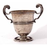 George V two handled presentation engraved trophy cup with girdled body and spreading foot (a/f),