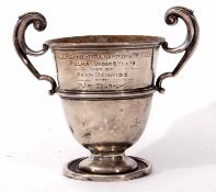 George V two handled presentation engraved trophy cup with girdled body and spreading foot (a/f),