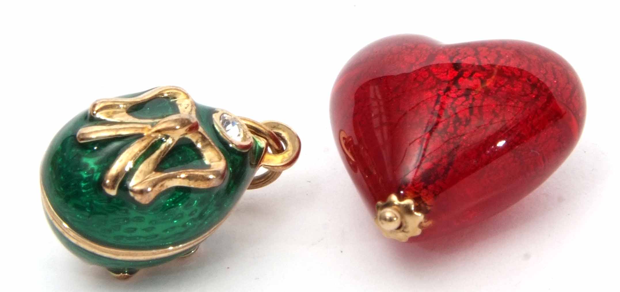 Mixed Lot: modern red enamel heart pendant/charm, the bale stamped 375, together with a modern green
