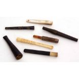 Mixed Lot: comprising an early 20th century cased Dunhill cigarette holder of sliding form with