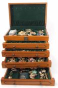 Large simulated wood jewellery box with four sliding drawers to include a large quantity of