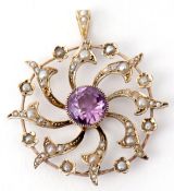 Amethyst and seed pearl pendant, of circular form, open work design, the central faceted amethyst