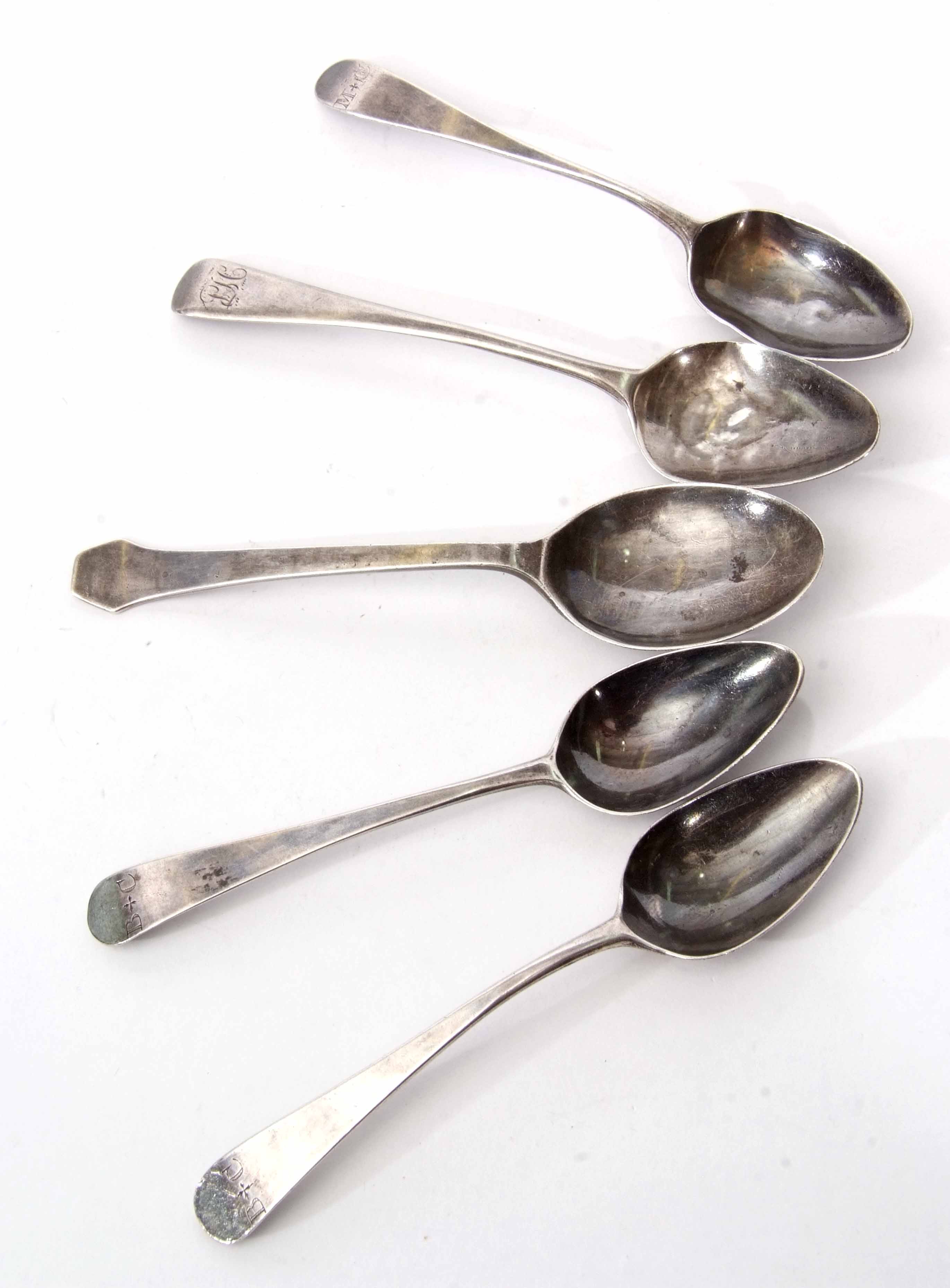 Mixed Lot: comprising four various George III tea spoons, all with contemporary initials, together