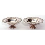 Two Edward VII small table bowls, each of circular form with cast and applied shell and foliate