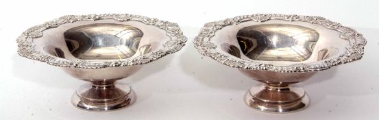 Two Edward VII small table bowls, each of circular form with cast and applied shell and foliate