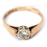 A 9ct gold and diamond ring, the brilliant cut diamond 0.15ct approx in an illusion setting