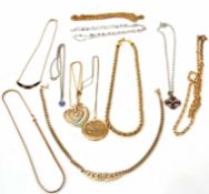 Mixed Lot: costume jewellery to include a circular rolled gold locket, engraved decoration to the