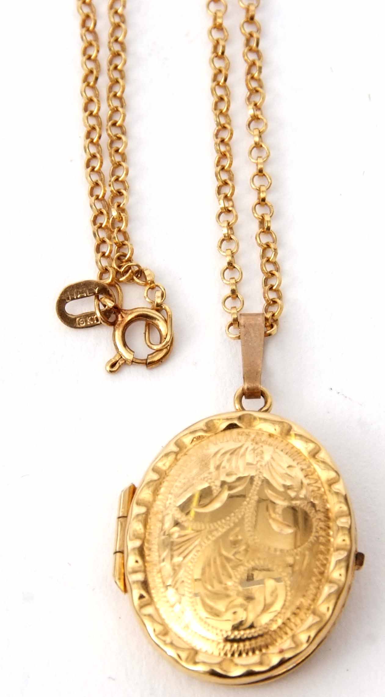 Modern 9ct gold locket and chain, the oval shaped locket with chased engraved foliate design