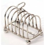 Edward VII six slice toast rack of heavy gauge wire work construction with arched frame on a