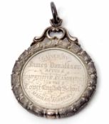 19th century cased Education medallion of circular form with wreath surround and ring suspension