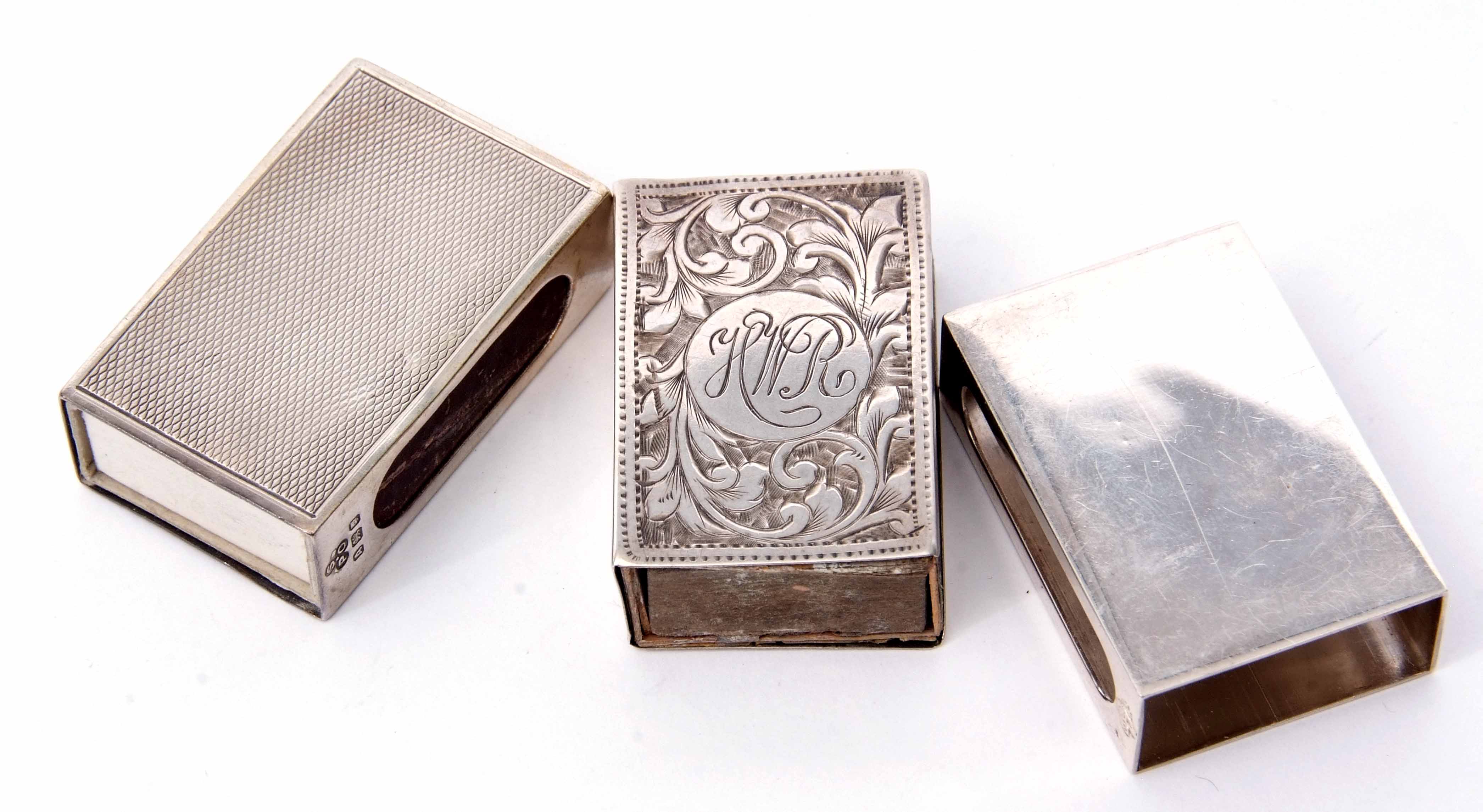 Mixed Lot: comprising three various hallmarked silver matchbox covers, each of rectangular form with